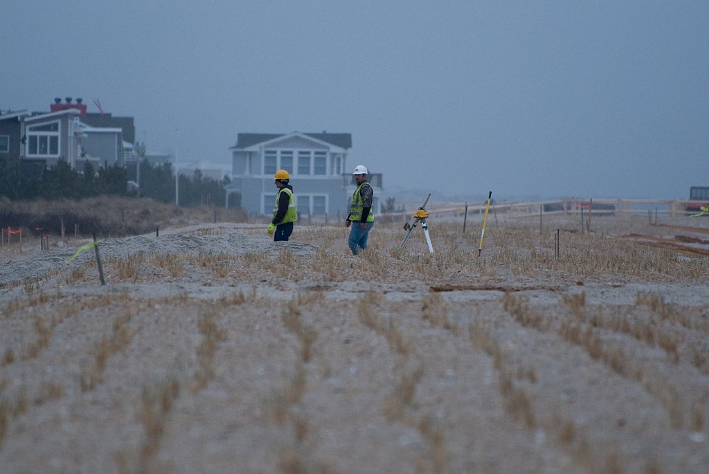 DSC_7590.jpg - Workers laying out walkways over the dune around 76th Street.