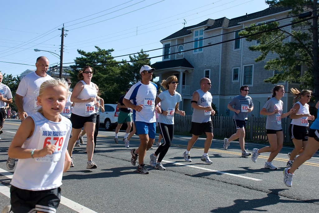 DSC_4340.jpg - All ages participate as they pass the shore house.