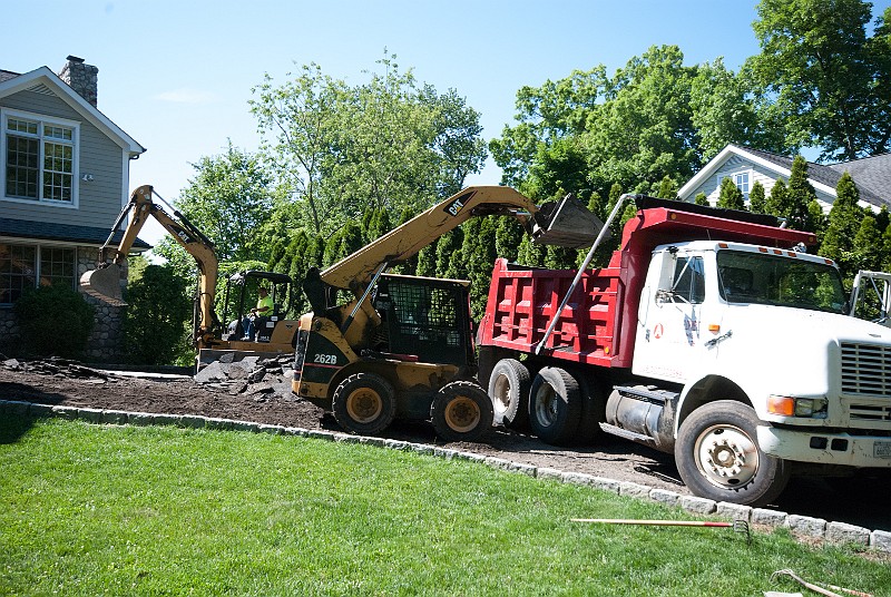 DSC_1814.jpg - With two shovels operating, the upper part of the driveway nears demolition.