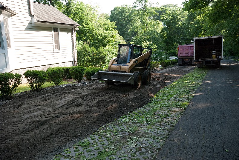 DSC_1847.jpg - More Item 4 base is added and spread.  This will assure a more permanent pavement.