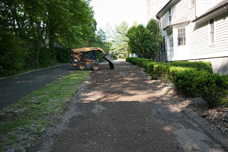 DSC_1849.jpg - More Item 4 base is added and spread.  This will assure a more permanent pavement.