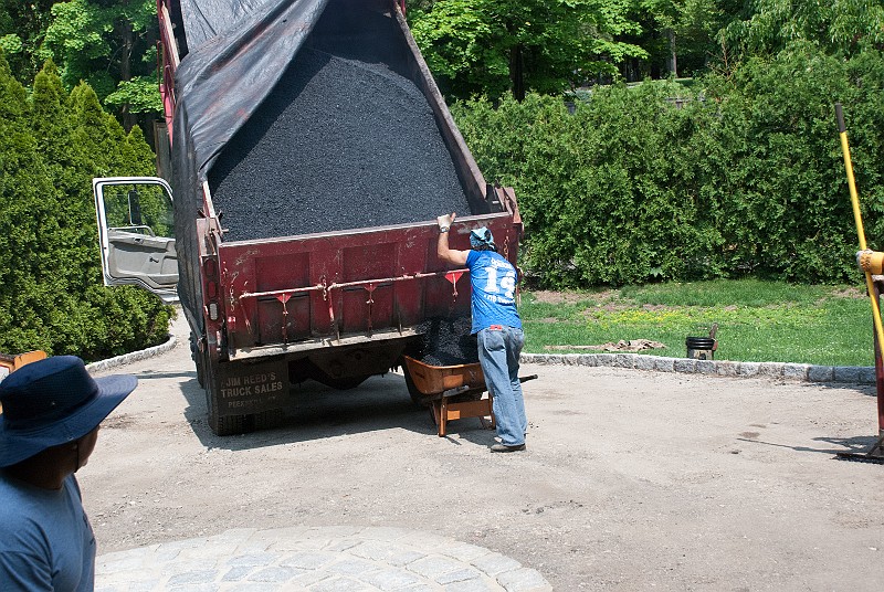 DSC_1873.jpg - Here comes the hot asphalt.