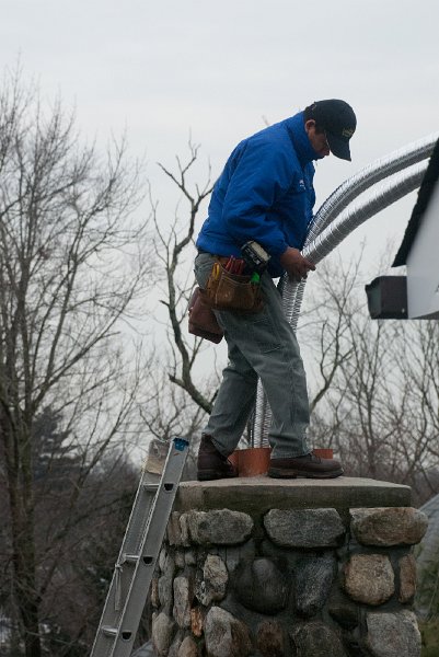 DSC_9078.jpg - Both ducts are fed down the flue.  This chimney is fairly short and straight.