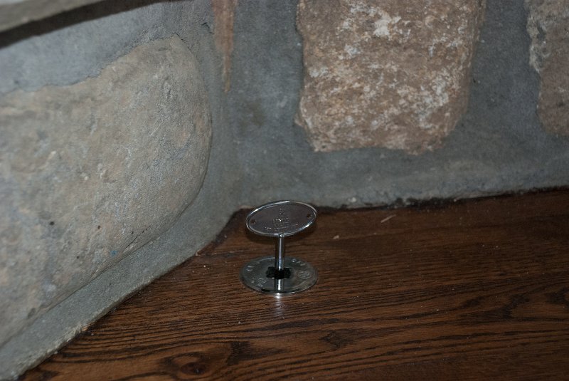 DSC_9168.jpg - The shut-off valve is controlled by a key in the family room floor.