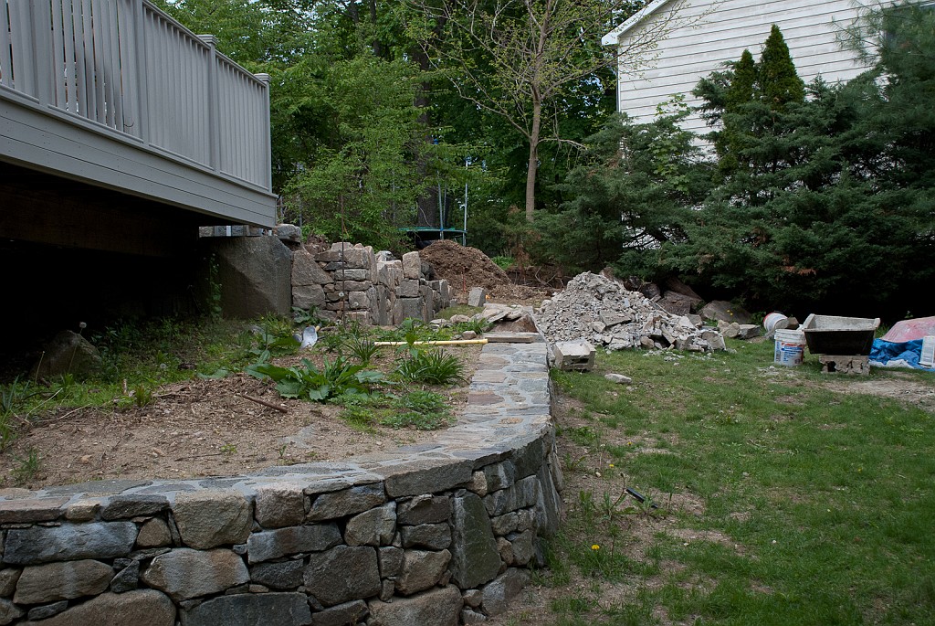 DSC_8519.jpg - Harold's wall looks great, but the landscape of rocks and weeds leaves much to be desired.