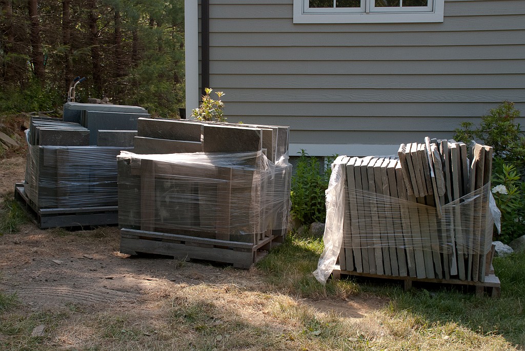 DSC_8596.jpg - The patio flagstone arrived this morning.  Some heavy lifting ahead.