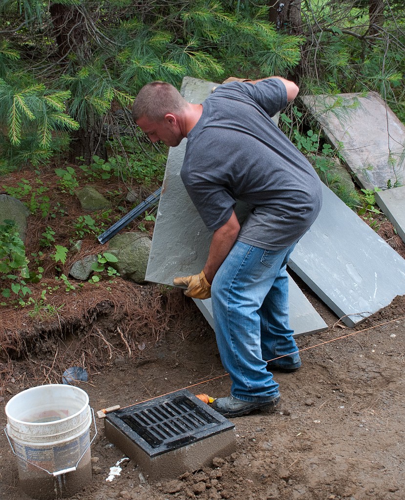 DSC_8612.jpg - Austin gets to lift the flagstones.