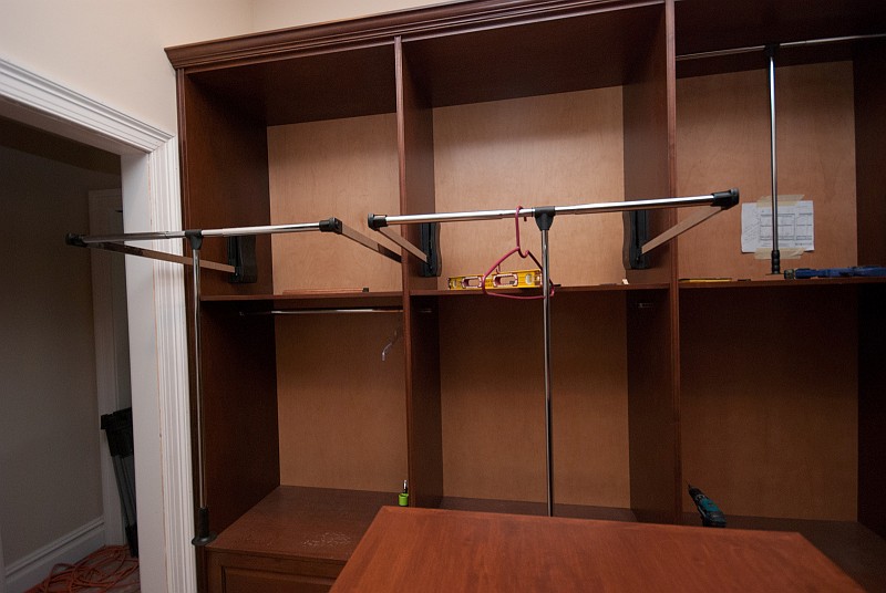 DSC_0256.jpg - These are the spring-loaded, swing-down, wardrobe hanger rods.  Clever, but will they still work when fully loaded?  We'll see...