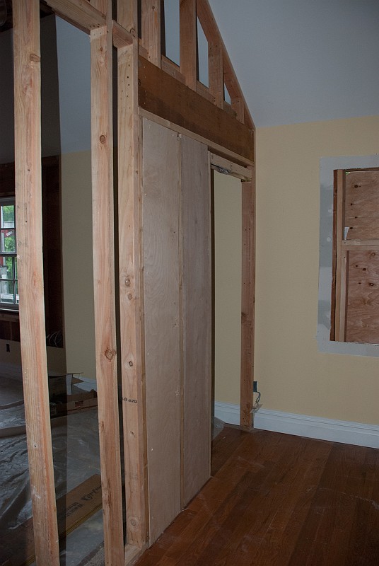 DSC_9487.jpg - Without the plywood panels, pocket door walls can be a little too flexible.