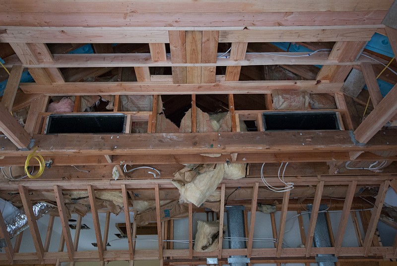 DSC_9635.jpg - The two rectangular return air ducts are installed in the coffered ceiling.  The wooden grills will come post-sheetrock.