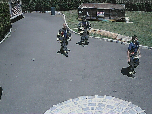IMG_20120710113900.jpg - Uh-oh.  Our fire alarm gets triggered, probably by dust or an overheated saw blade, and the fire department responds.  I hope that they don't send me a bill.  This is our first false alarm.  At least we now know that the system works.